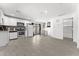A spacious living room with a full kitchen and modern appliances, great for entertaining and everyday living at 8044 N 10Th Pl, Phoenix, AZ 85020