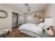 Serene bedroom with a queen bed, mirrored closet, and soft lighting, providing a tranquil and inviting space at 8338 E Monterosa St, Scottsdale, AZ 85251