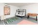 Bedroom featuring bunk beds, foosball table, and decorative fox wall art at 8338 E Monterosa St, Scottsdale, AZ 85251