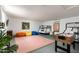Spacious bedroom with bunk beds, a foosball table, and colorful seating at 8338 E Monterosa St, Scottsdale, AZ 85251