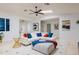 Comfortable living room featuring a sectional sofa, skylight, and stylish decor, perfect for relaxation at 8338 E Monterosa St, Scottsdale, AZ 85251