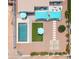 Aerial shot showcasing the home's layout, pool, outdoor seating, and landscaped backyard at 8444 E Piccadilly Rd, Scottsdale, AZ 85251