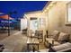 This covered patio with comfortable lounge seating is the perfect outdoor space to relax and entertain at 8444 E Piccadilly Rd, Scottsdale, AZ 85251