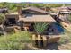 Modern southwestern home with a private pool, open patio, and desert landscaping at 9998 E Taos Dr, Scottsdale, AZ 85262