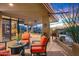 Comfortable patio features cozy seating and desert views, perfect for outdoor relaxation and entertaining guests at 9998 E Taos Dr, Scottsdale, AZ 85262
