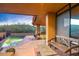 Picturesque pool patio featuring desert views, comfortable lounge chairs, and convenient access to indoor spaces at 9998 E Taos Dr, Scottsdale, AZ 85262
