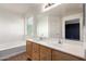 Bright bathroom featuring a double sink vanity and a soaking tub at 1210 W Agrarian Hills Dr, San Tan Valley, AZ 85143