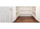 Walk-in pantry featuring tile flooring with lots of space for storage at 1210 W Agrarian Hills Dr, San Tan Valley, AZ 85143