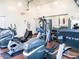 Well-equipped gym featuring treadmills, ellipticals, and weight machines at 1850 E Maryland Ave # 63, Phoenix, AZ 85016