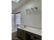 Bathroom featuring a tub and a large vanity at 3229 W Five Mile Peak Dr, San Tan Valley, AZ 85144