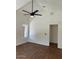 Bedroom with a ceiling fan and walk-in closet access at 3229 W Five Mile Peak Dr, San Tan Valley, AZ 85144