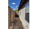 Functional side yard featuring gravel and a practical location for the AC unit at 3229 W Five Mile Peak Dr, San Tan Valley, AZ 85144