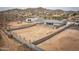 Expansive desert lot with block fence; a blank canvas awaits your dream home design with neighboring houses in view at 34047 N 10Th St, Phoenix, AZ 85085