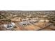 Community aerial view showcasing desert landscape, various home styles, including solar-paneled roofs, and large lot opportunities at 34047 N 10Th St, Phoenix, AZ 85085