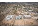 Community aerial view presenting diverse home designs, desert landscapes, and spacious lots with potential for customization at 34047 N 10Th St, Phoenix, AZ 85085