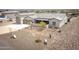 Aerial view showcasing home with a well-maintained front yard, xeriscaping, and a boat parked to the side at 34047 N 10Th St, Phoenix, AZ 85085