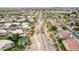Scenic aerial view of the neighborhood showcasing walking paths, green spaces, and diverse home styles at 4106 E Lavender Ln, Phoenix, AZ 85044