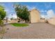 Large backyard featuring gravel, artificial turf, and an open view at 4106 E Lavender Ln, Phoenix, AZ 85044