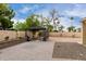 Backyard patio featuring a gazebo and a mix of pavers, stone, and gravel at 4106 E Lavender Ln, Phoenix, AZ 85044