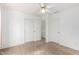 Bright bedroom features standard closet, carpet floors, ample natural light, and fresh design at 4106 E Lavender Ln, Phoenix, AZ 85044