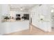 Well-lit kitchen with white cabinets, black appliances, and a functional layout at 4106 E Lavender Ln, Phoenix, AZ 85044