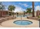 Inviting community pool and spa with shade structures and lounge chairs for relaxing on sunny days at 4106 E Lavender Ln, Phoenix, AZ 85044