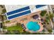 Aerial view of a home's backyard oasis featuring a pool, patio seating, lounge chairs and lush landscaping at 5001 E Redfield Rd, Scottsdale, AZ 85254