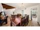 Open-concept dining area with vaulted wood ceilings and ample space for entertaining at 5001 E Redfield Rd, Scottsdale, AZ 85254