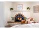 Close-up of a cozy fireplace with charming details and decorative accents, creating a warm ambiance at 5001 E Redfield Rd, Scottsdale, AZ 85254