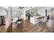 Well-lit kitchen with stainless steel appliances, breakfast bar, and dining area with ample natural light at 5001 E Redfield Rd, Scottsdale, AZ 85254