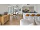 Bright eat-in kitchen with stainless steel appliances, a breakfast bar, and an adjacent dining area at 5001 E Redfield Rd, Scottsdale, AZ 85254