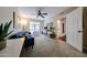 Bedroom with a blue sofa and ceiling fan at 5120 E Janice Way, Scottsdale, AZ 85254