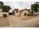 Charming desert home with a private gated entry, offering both security and aesthetic appeal to the property at 5120 E Janice Way, Scottsdale, AZ 85254