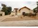Charming single-story home featuring a desert-landscaped front yard and gated entry, perfect for curb appeal at 5120 E Janice Way, Scottsdale, AZ 85254