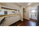 Open kitchen featuring granite countertops, white cabinets, and stainless steel appliances at 5120 E Janice Way, Scottsdale, AZ 85254