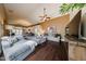 Expansive living room featuring wood floors, comfortable seating, and stylish accents for a cozy atmosphere at 5120 E Janice Way, Scottsdale, AZ 85254