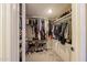 Walk-in closet with clothing racks and shoe shelves offers plenty of storage at 5120 E Janice Way, Scottsdale, AZ 85254