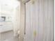 Bathroom featuring a shower, toilet and sink with white cabinetry at 5412 E Rockridge Rd, Phoenix, AZ 85018