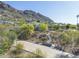 A beautiful exterior shot of the property nestled in the desert landscape at 5412 E Rockridge Rd, Phoenix, AZ 85018