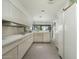 Clean, bright kitchen with white cabinetry and stainless-steel appliances at 5412 E Rockridge Rd, Phoenix, AZ 85018