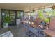 Relaxing outdoor seating area with a variety of chairs, tables, and decorative elements at 5412 E Rockridge Rd, Phoenix, AZ 85018