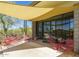 Outdoor patio featuring a shade awning and various seating arrangements, perfect for relaxation and enjoyment at 5412 E Rockridge Rd, Phoenix, AZ 85018