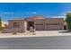 Charming single-story home with a gated front entry and a three car garage, perfect for modern living at 6043 W Robin Ln, Glendale, AZ 85310