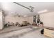 Spacious two car garage with concrete floor and multiple storage areas at 6043 W Robin Ln, Glendale, AZ 85310