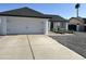 Beautiful single-Gathering home with a wide driveway and attached two-car garage at 6217 W Comet Ave, Glendale, AZ 85302