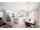 Bright dining and kitchen area with stainless appliances and view of the backyard swimming pool at 6915 E Sandra Ter, Scottsdale, AZ 85254