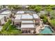 Aerial view of the home with a pool, patio, and desert landscaping at 11366 E White Feather Ln, Scottsdale, AZ 85262