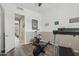Bright home gym offers an airy space with workout equipment and easy access to other rooms at 11366 E White Feather Ln, Scottsdale, AZ 85262