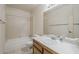Cozy bathroom features a shower/tub combo and a single sink vanity at 14221 N 45Th St, Phoenix, AZ 85032