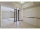 Dining area with tile flooring and an open view to the living room at 14221 N 45Th St, Phoenix, AZ 85032
